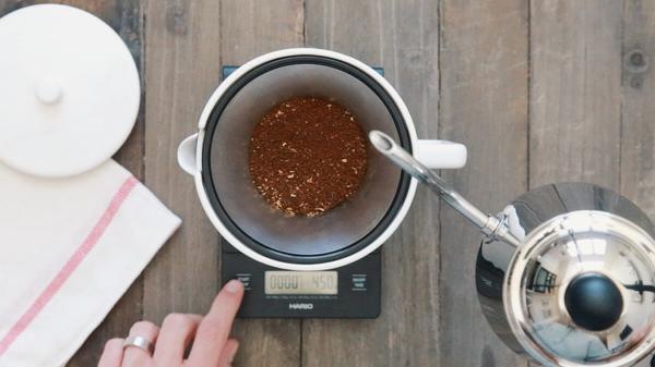 Coffee grounds in a metal Able Kone